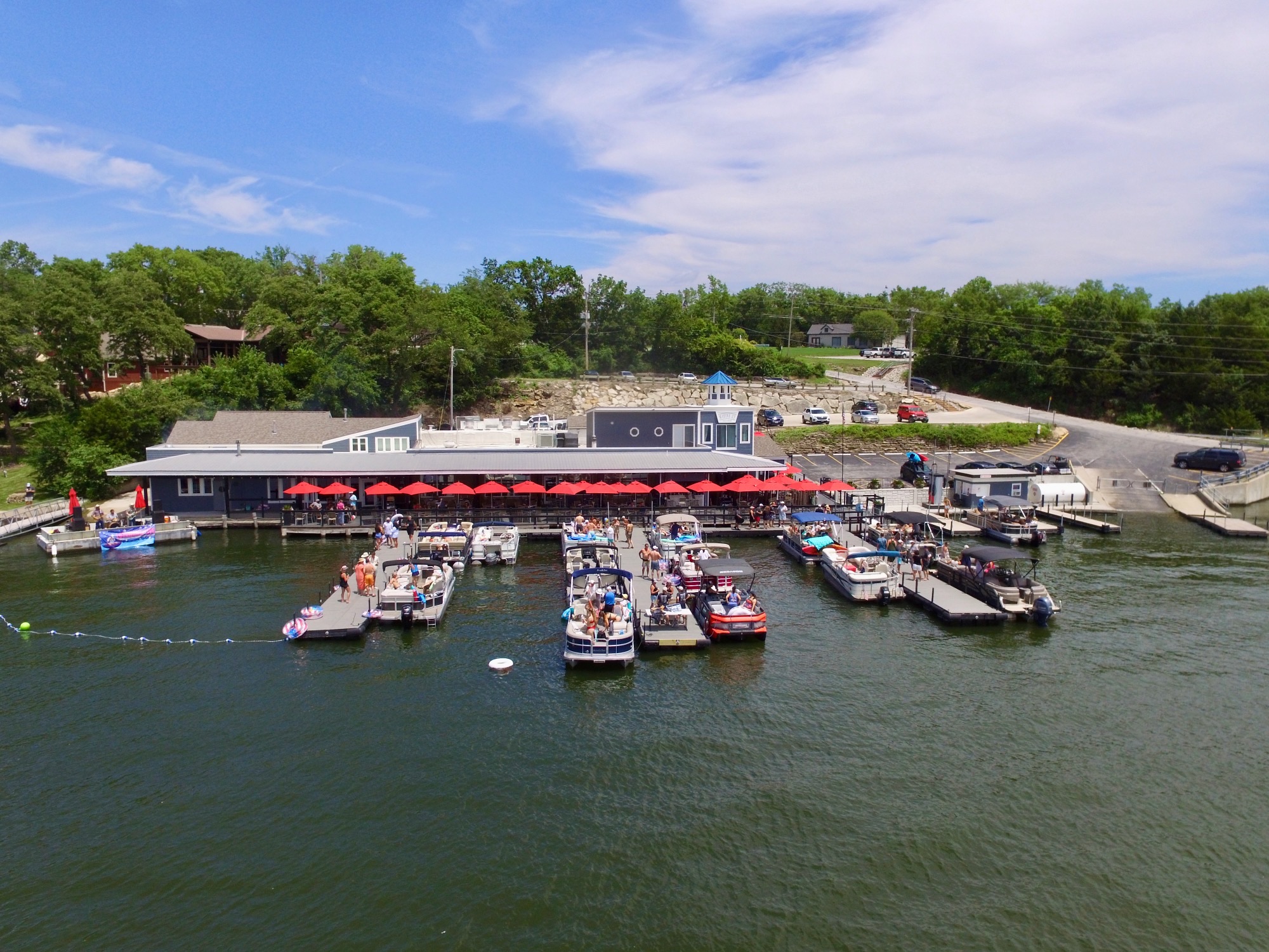 Aerial view of the floating barge concert at Marina 27 during the 2024 Whiskey Trio show